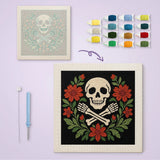 Toile imprimée numérotée et tableau punch needle tête de mort fleurie terminé