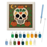 Contenu du kit punch needle crâne potager : toile sur cadre, aiguilles et fils de laine