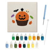 Contenu du kit punch needle Halloween cupcake potiron : toile sur cadre, aiguilles et fils de laine