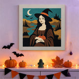 Tableau punch needle dame au potiron accroché au mur dans une déco d'Halloween