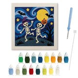 Contenu du kit punch needle squelettes : toile sur cadre, aiguilles et fils de laine