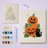 Toile imprimée numérotée et tableau punch needle duo citrouilles terminé