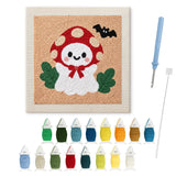 Contenu du kit punch needle fantôme amanite : toile sur cadre, aiguilles et fils de laine
