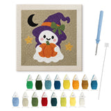 Contenu du kit punch needle fantôme sorcière : toile sur cadre, aiguilles et fils de laine