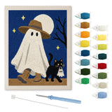 Contenu du kit punch needle fantôme baladeur : toile sur cadre, aiguilles et fils de laine