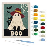 Contenu du kit punch needle fantôme chapeau : toile sur cadre, aiguilles et fils de laine