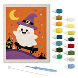 Contenu du kit punch needle fantôme château : toile sur cadre, aiguilles et fils de laine