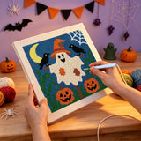 Broderie punch needle en cours sur la toile du fantôme et des deux corbeaux
