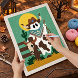 Broderie punch needle en cours sur la toile du fantôme cowboy au lasso, aiguille en main
