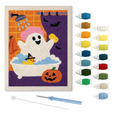 Contenu du kit punch needle fantôme au bain : toile sur cadre, aiguilles et fils de laine