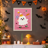 Tableau punch needle fantôme à la sucette accroché au mur dans une déco d'Halloween