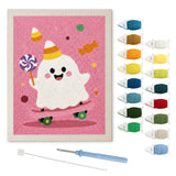 Contenu du kit punch needle fantôme gourmand : toile sur cadre, aiguilles et fils de laine