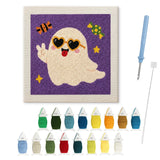 Contenu du kit punch needle fantôme à lunettes : toile sur cadre, aiguilles et fils de laine