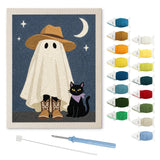 Contenu du kit punch needle fantôme santiags : toile sur cadre, aiguilles et fils de laine