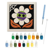 Contenu du kit punch needle fleur momie : toile sur cadre, aiguilles et fils de laine