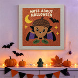 Tableau punch needle gland vampire accroché au mur dans une déco d'Halloween