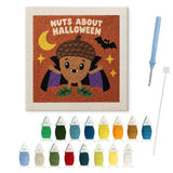 Contenu du kit punch needle gland Halloween : toile sur cadre, aiguilles et fils de laine