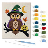 Contenu du kit punch needle hibou sorcier : toile sur cadre, aiguilles et fils de laine