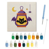 Contenu du kit punch needle Halloween lanterne : toile sur cadre, aiguilles et fils de laine