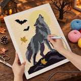 Broderie punch needle en cours sur la toile du loup face à la lune, aiguille en main