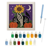 Contenu du kit punch needle main tournesol : toile sur cadre, aiguilles et fils de laine