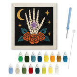 Contenu du kit punch needle main voyante : toile sur cadre, aiguilles et fils de laine