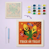 Toile imprimée numérotée à côté du tableau punch needle maïs vampire terminé
