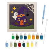 Contenu du kit punch needle maison chapeau : toile sur cadre, aiguilles et fils de laine