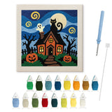 Contenu du kit punch needle maison hantée : toile sur cadre, aiguilles et fils de laine