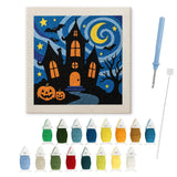Contenu du kit punch needle manoir : toile sur cadre, aiguilles et fils de laine
