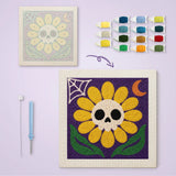 Toile imprimée numérotée et tableau punch needle fleur jaune à tête de mort terminé
