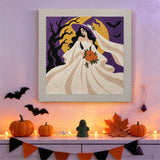 Tableau punch needle mariée gothique accroché au mur dans une déco d'Halloween