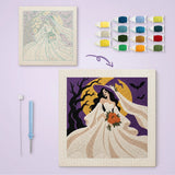 Toile imprimée numérotée et tableau punch needle mariée en robe blanche terminé