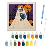 Contenu du kit punch needle mariée squelette : toile sur cadre, aiguilles et fils de laine