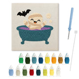 Contenu du kit punch needle momie au bain : toile sur cadre, aiguilles et fils de laine