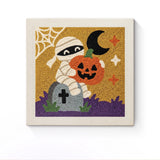 Punch Needle Halloween Momie Citrouille : tableau brodé terminé sur son cadre