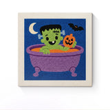 Punch Needle Halloween Monstre au Bain : tableau brodé terminé sur son cadre