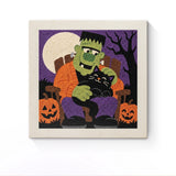 Punch Needle Halloween Monstre au Chat : tableau brodé terminé sur son cadre