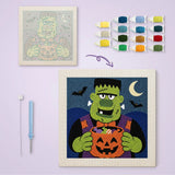 Toile imprimée numérotée et tableau punch needle monstre au seau citrouille terminé