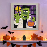 Tableau punch needle monstre chimiste accroché au mur dans une déco d'Halloween