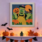 Tableau punch needle monstre fermier au mur d'une pièce décorée pour Halloween