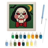 Contenu du kit punch needle pantin spirales : toile sur cadre, aiguilles et fils de laine