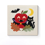 Punch Needle Halloween Pomme Vampire : tableau brodé terminé sur son cadre