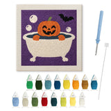 Contenu du kit punch needle potiron au bain : toile sur cadre, aiguilles et fils de laine