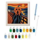 Contenu du kit punch needle citrouille Halloween : toile sur cadre, aiguilles et fils de laine