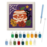 Contenu du kit punch needle potiron momifié : toile sur cadre, aiguilles et fils de laine