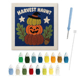 Contenu du kit punch needle potirons Halloween : toile sur cadre, aiguilles et fils de laine