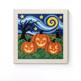 Punch Needle Halloween Potirons Étoilés : tableau brodé terminé sur son cadre