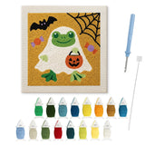 Contenu du kit punch needle grenouille : toile sur cadre, aiguilles et fils de laine
