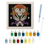 Contenu du kit punch needle roses squelette : toile sur cadre, aiguilles et fils de laine